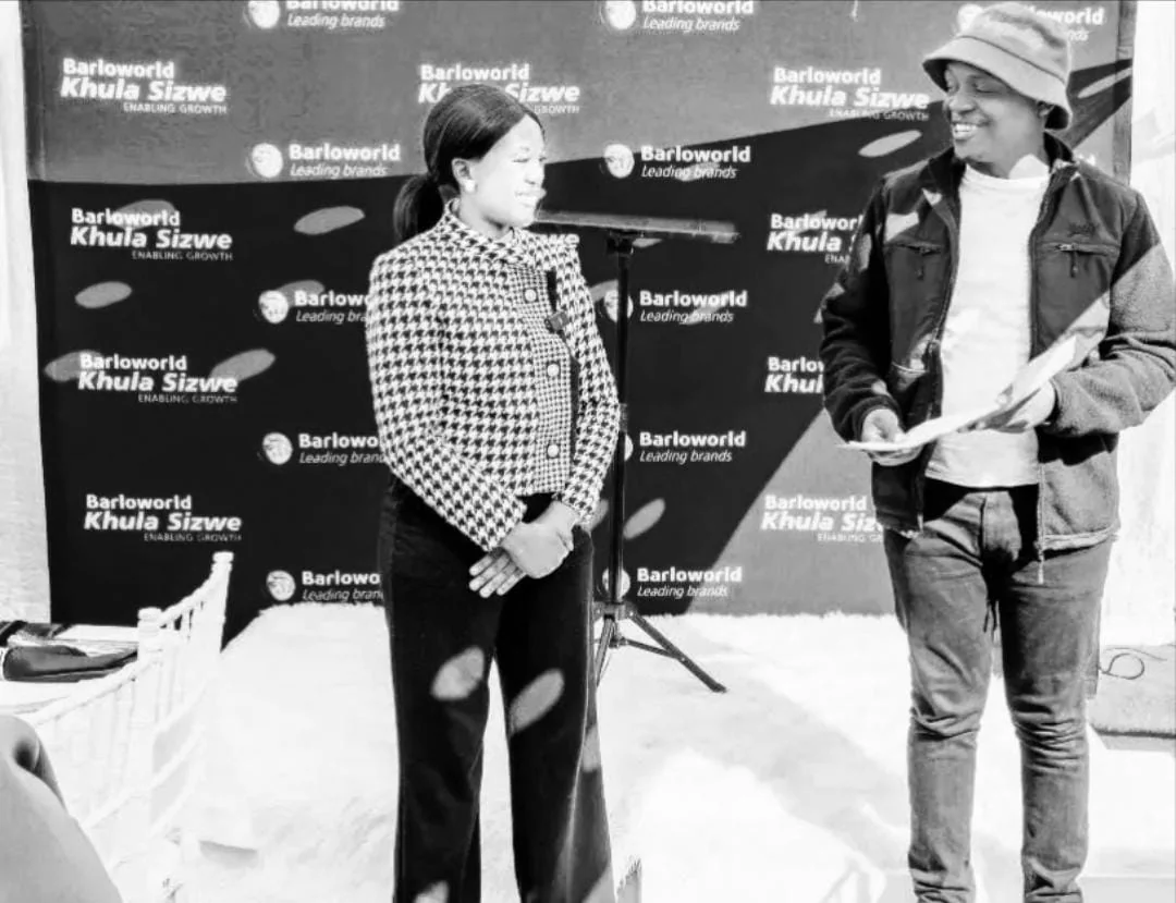 Partnership handshake representing Barloworld Khula Sizwe sponsorship