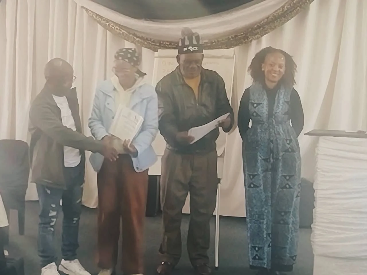 Graduates receiving certificates at the KhulaSizwe certificate award ceremony